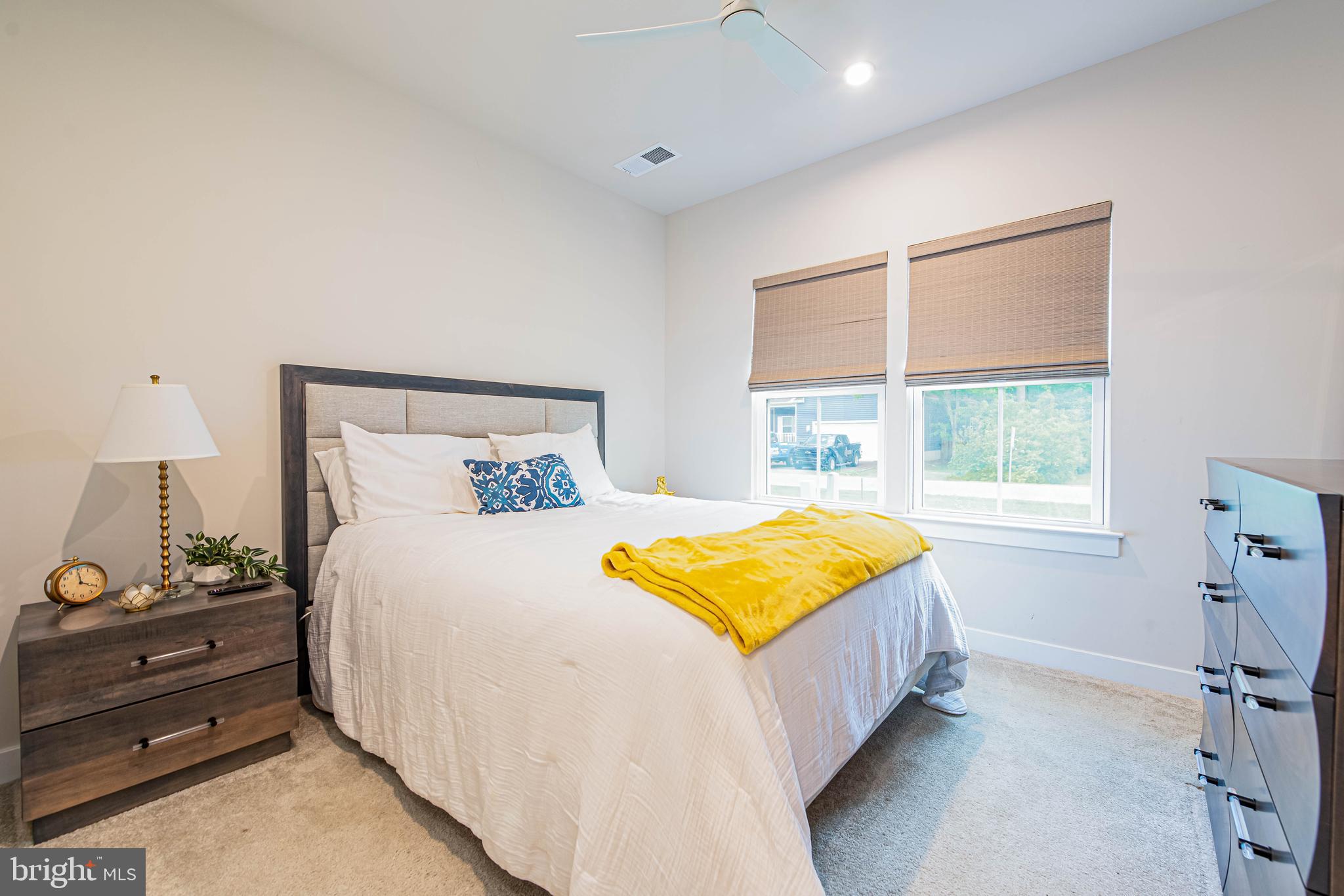 12115 Snug Harbor Road Berlin, MD 21811 - Photo 22 of 46 a bedroom with a bed and window