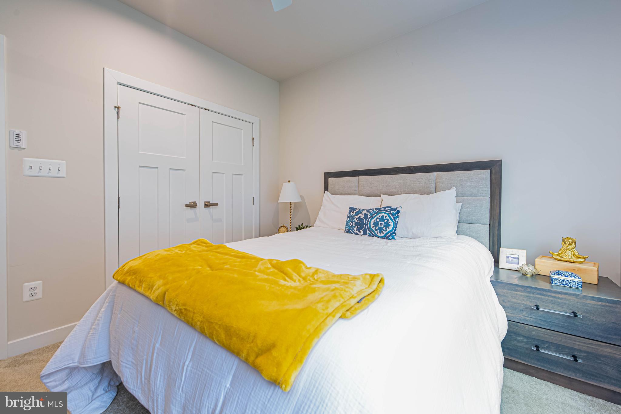 12115 Snug Harbor Road Berlin, MD 21811 - Photo 23 of 46 a bedroom with a bed and a window