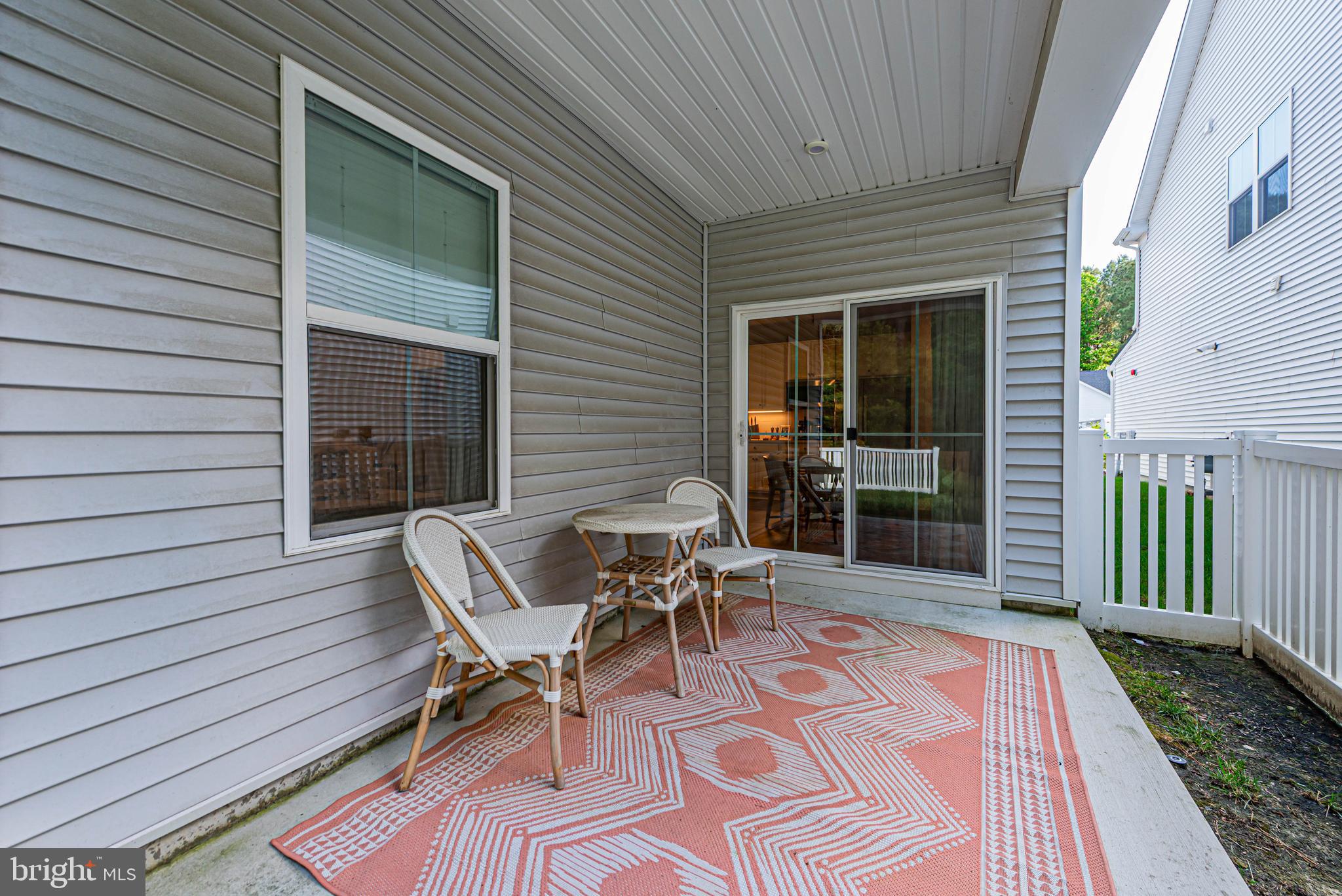 12115 Snug Harbor Road Berlin, MD 21811 - Photo 3 of 46 a balcony with table and chairs