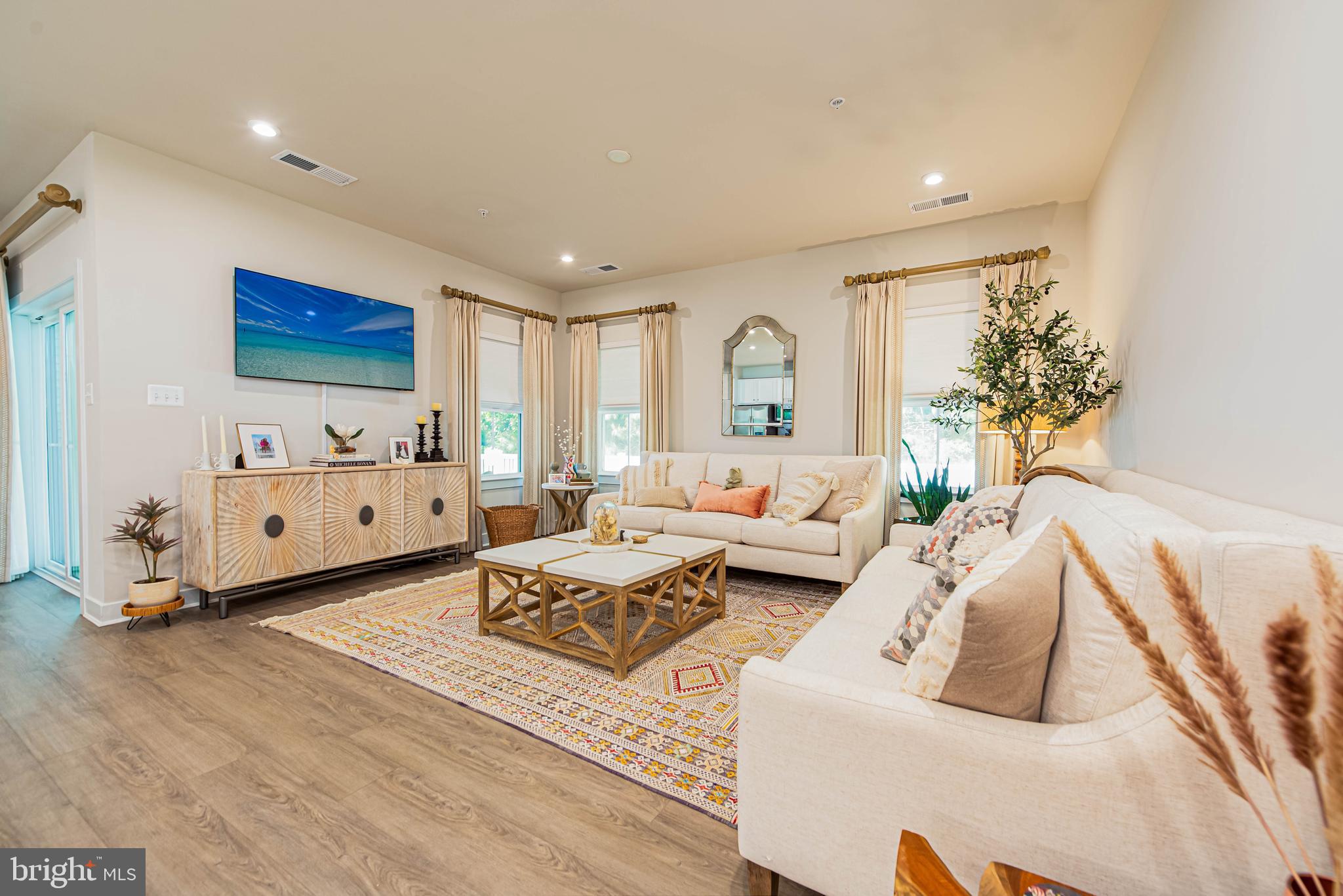 12115 Snug Harbor Road Berlin, MD 21811 - Photo 8 of 46 a living room with furniture and a window