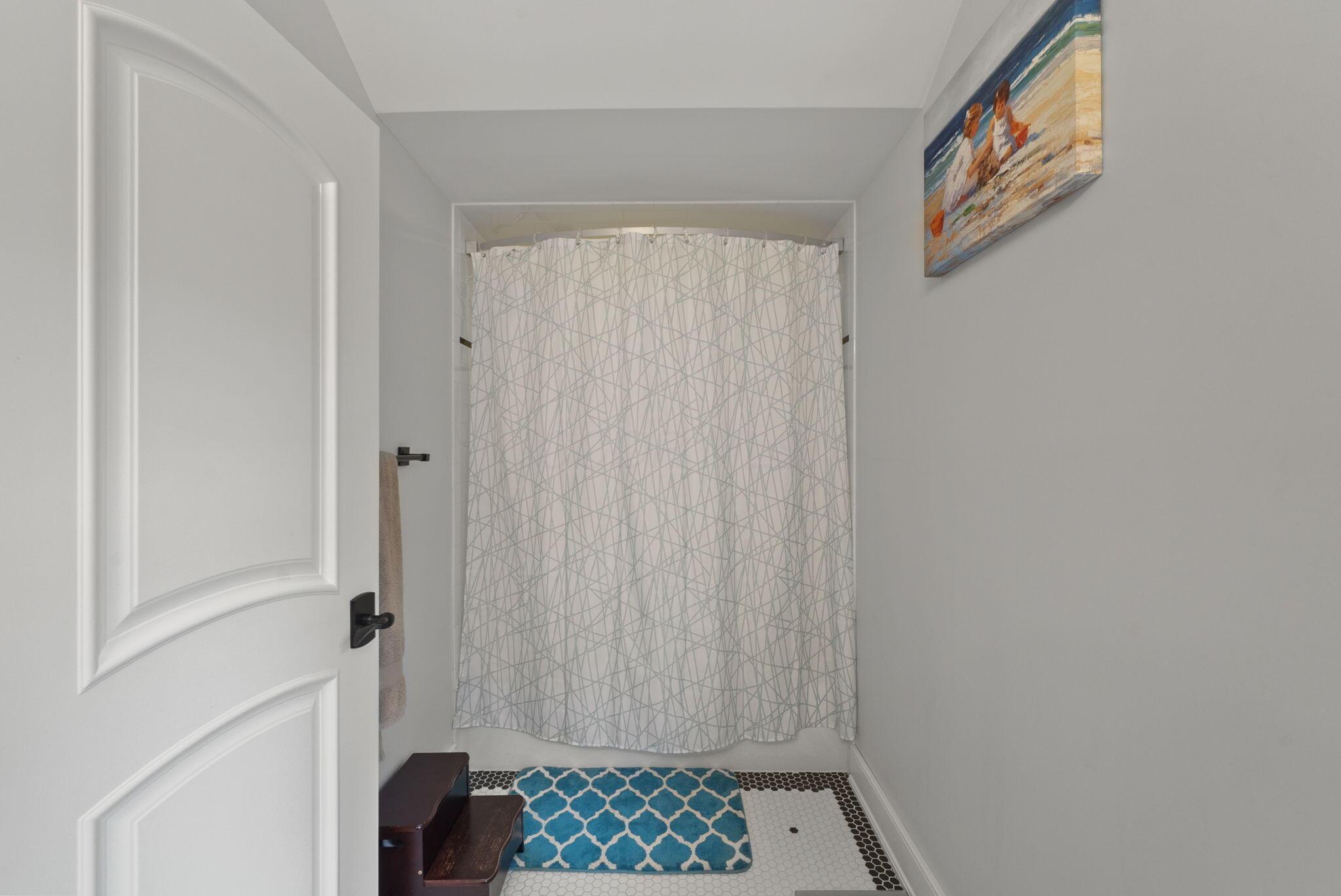1851 Berkshire Road Columbus, OH 43221 - Photo 50 of 125 Second full bath with elevated tile floors.