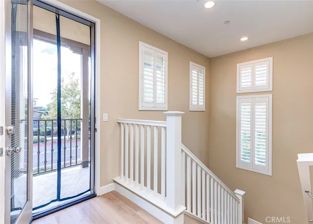 a view of entryway with wooden floor