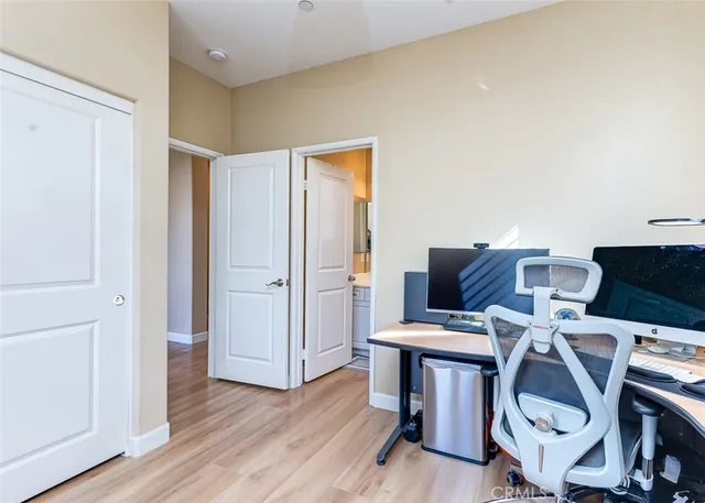 a view of workspace with wooden floor