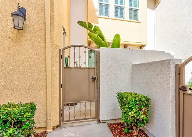 a patio with a patio table and chairs