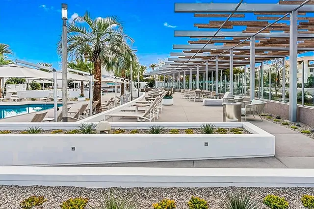 a view of a park with seating space