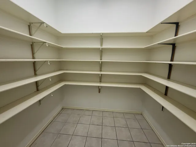 a view of living room with wooden floor and window