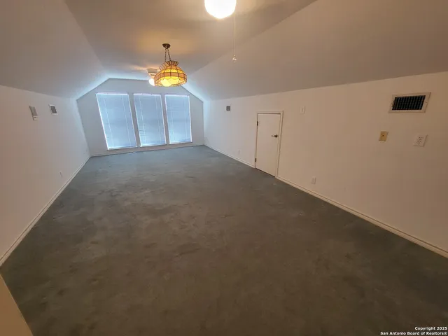 a view of a kitchen with a sink