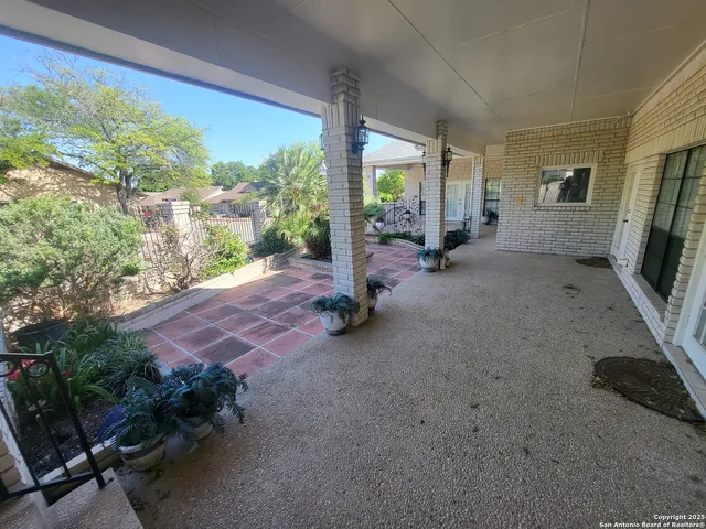 a view of a room with porch and wooden floor