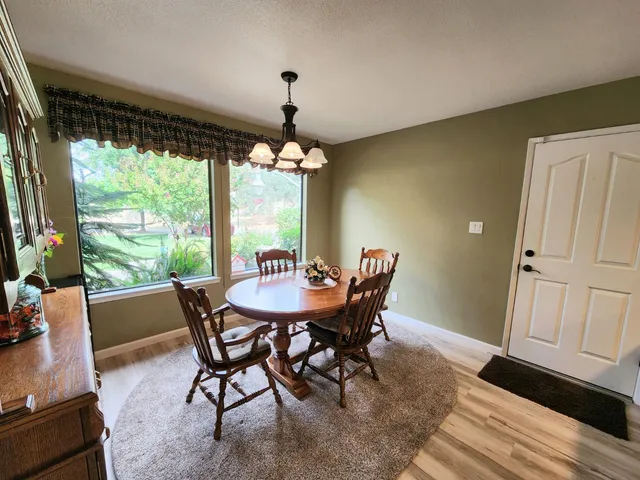 a bedroom with a bed and ceiling fan