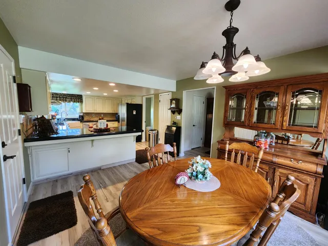 a bedroom with a large bed and a large window