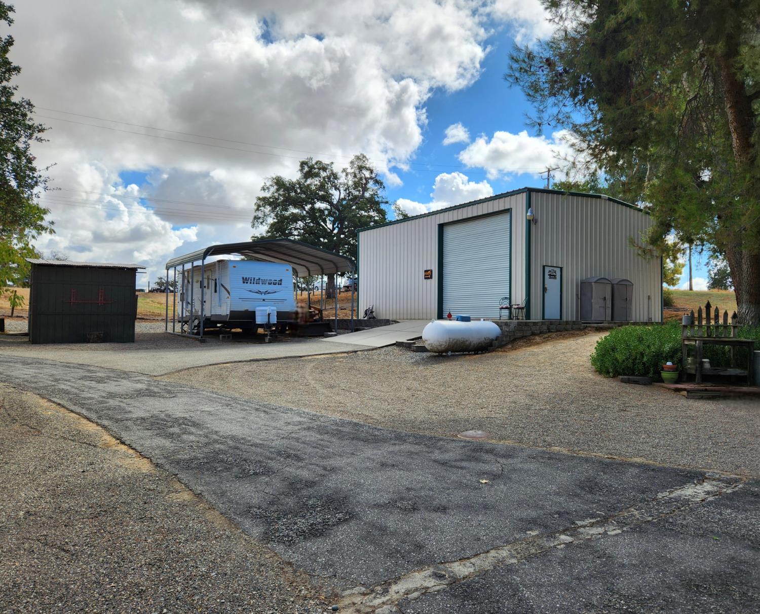 22266 Frontier Road Clovis, CA 93619 - Photo 37 of 61 a car parked in front of house