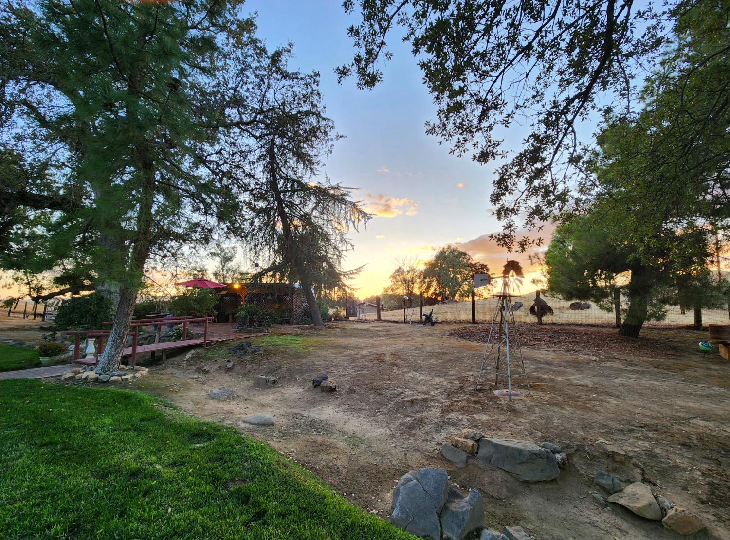 22266 Frontier Road Clovis, CA 93619 - Photo 56 of 61 a backyard of a house with lots of green space