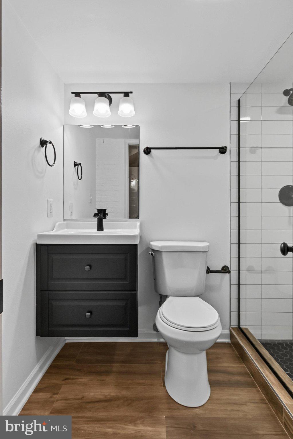 738 11th Street Northeast, Unit 3 Washington, DC 20002 - Photo 22 of 29 Sleek modern bathroom with stylish fixtures.