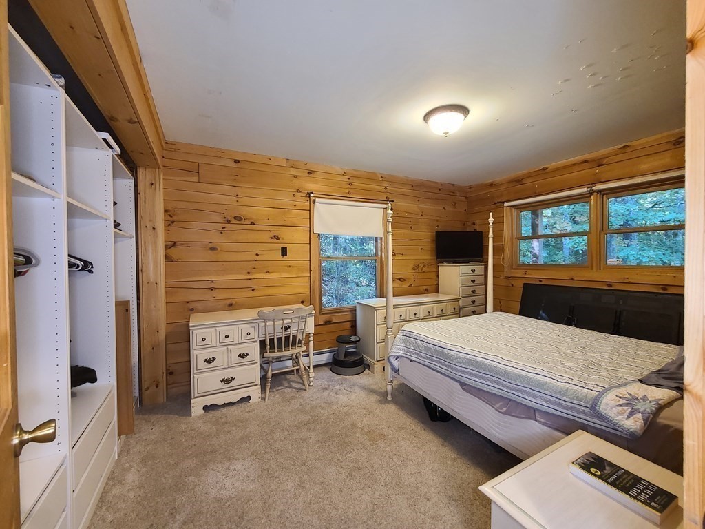 118 Town Farm Road Brookfield, MA 01506 - Photo 12 of 26 a bedroom with a bed and a dresser