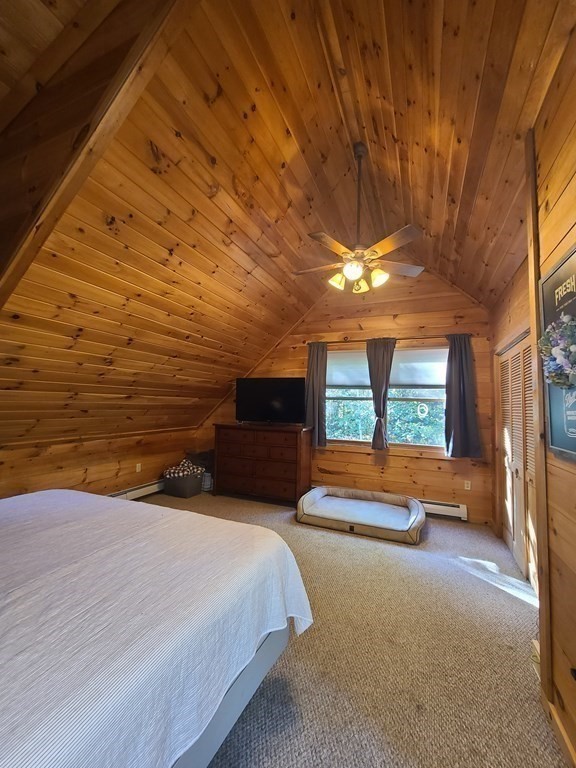 118 Town Farm Road Brookfield, MA 01506 - Photo 17 of 26 a bedroom with furniture and large windows