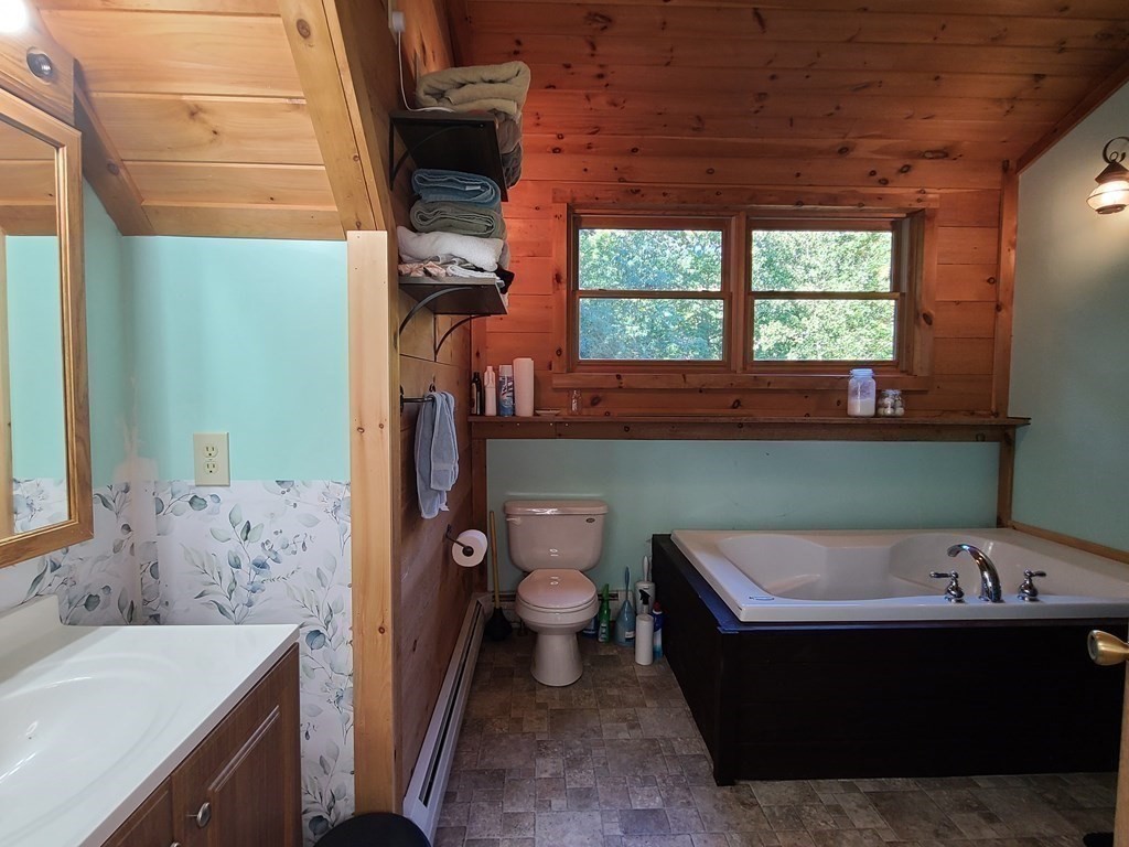 118 Town Farm Road Brookfield, MA 01506 - Photo 18 of 26 a bathroom with a bathtub sink and toilet