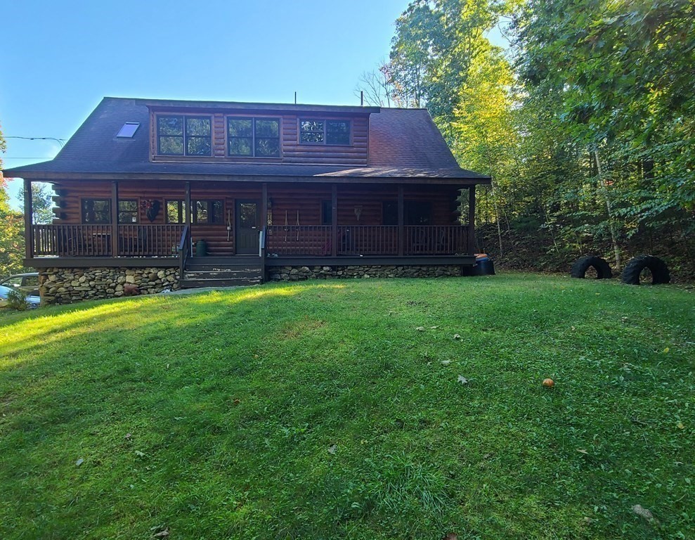 118 Town Farm Road Brookfield, MA 01506 - Photo 2 of 26 a view of a house with a yard