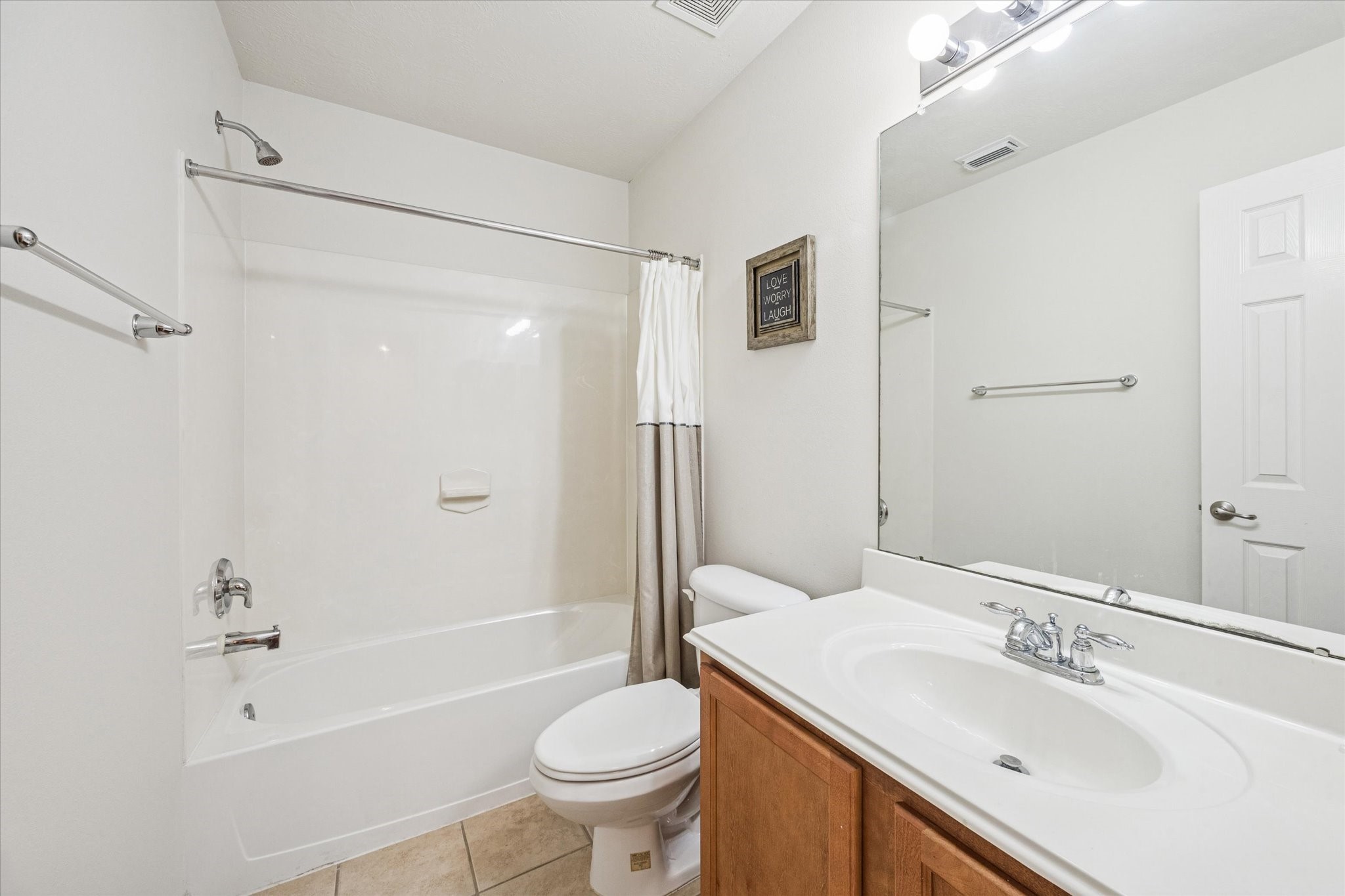 3206 Pearl Bluff Lane Houston, TX 77047 - Photo 17 of 20 a bathroom with a sink toilet and shower
