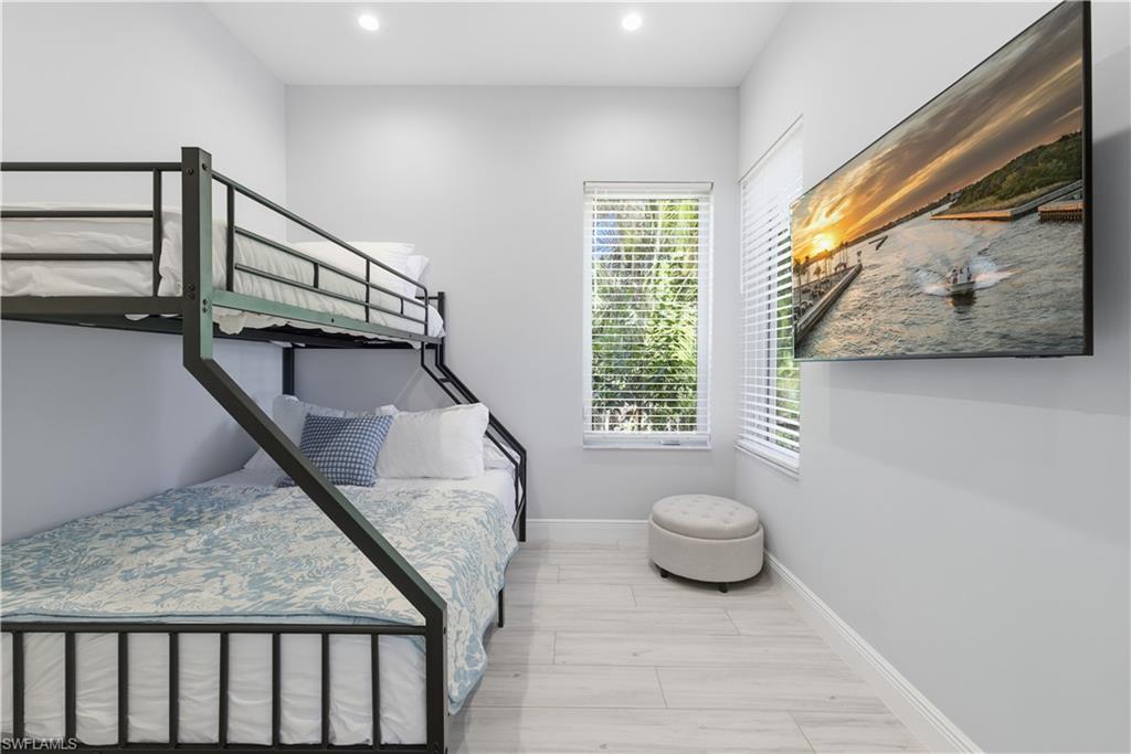 711 91st Avenue North Naples, FL 34108 - Photo 13 of 29 a view of entryway and bedroom