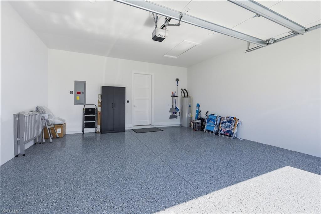 711 91st Avenue North Naples, FL 34108 - Photo 27 of 29 a view of a livingroom with space and a ceiling fan