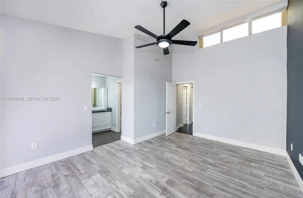 a view of an empty room and window