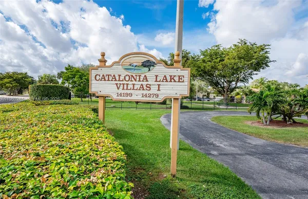 a view of a park with welcome board