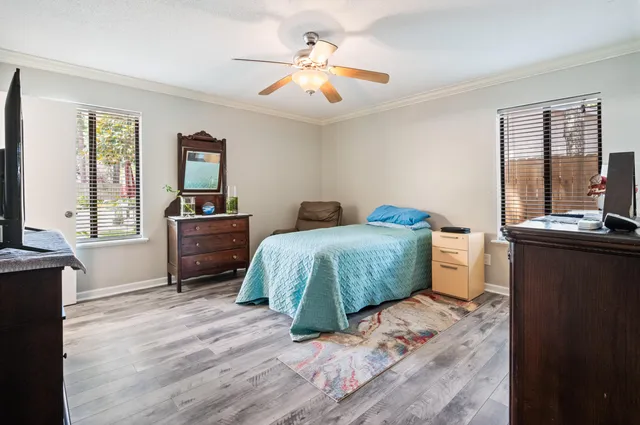 a bathroom with a toilet a sink and a mirror