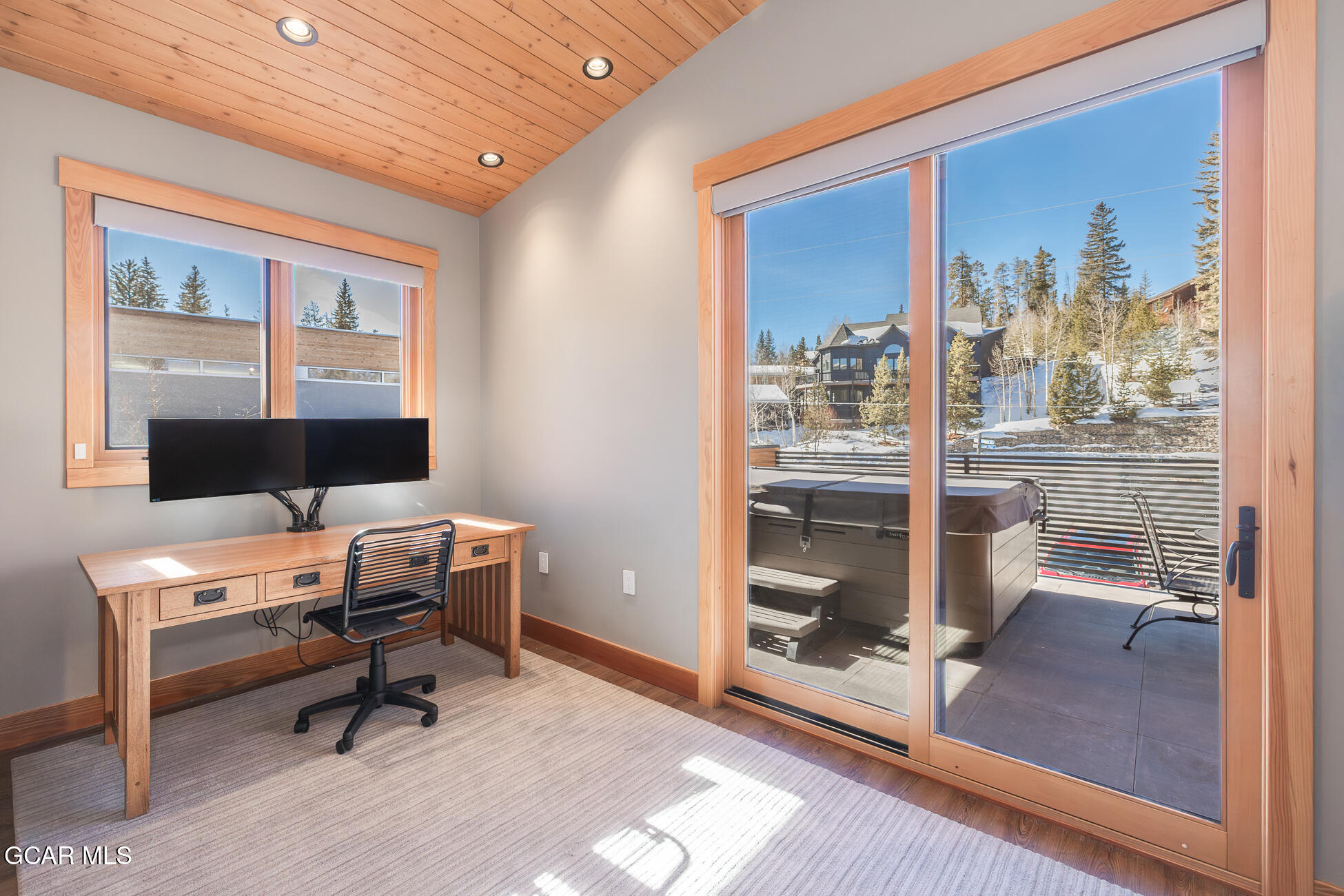 684 Vasquez Road Winter Park, CO 80482 - Photo 31 of 45 a view of a workspace with furniture and a window