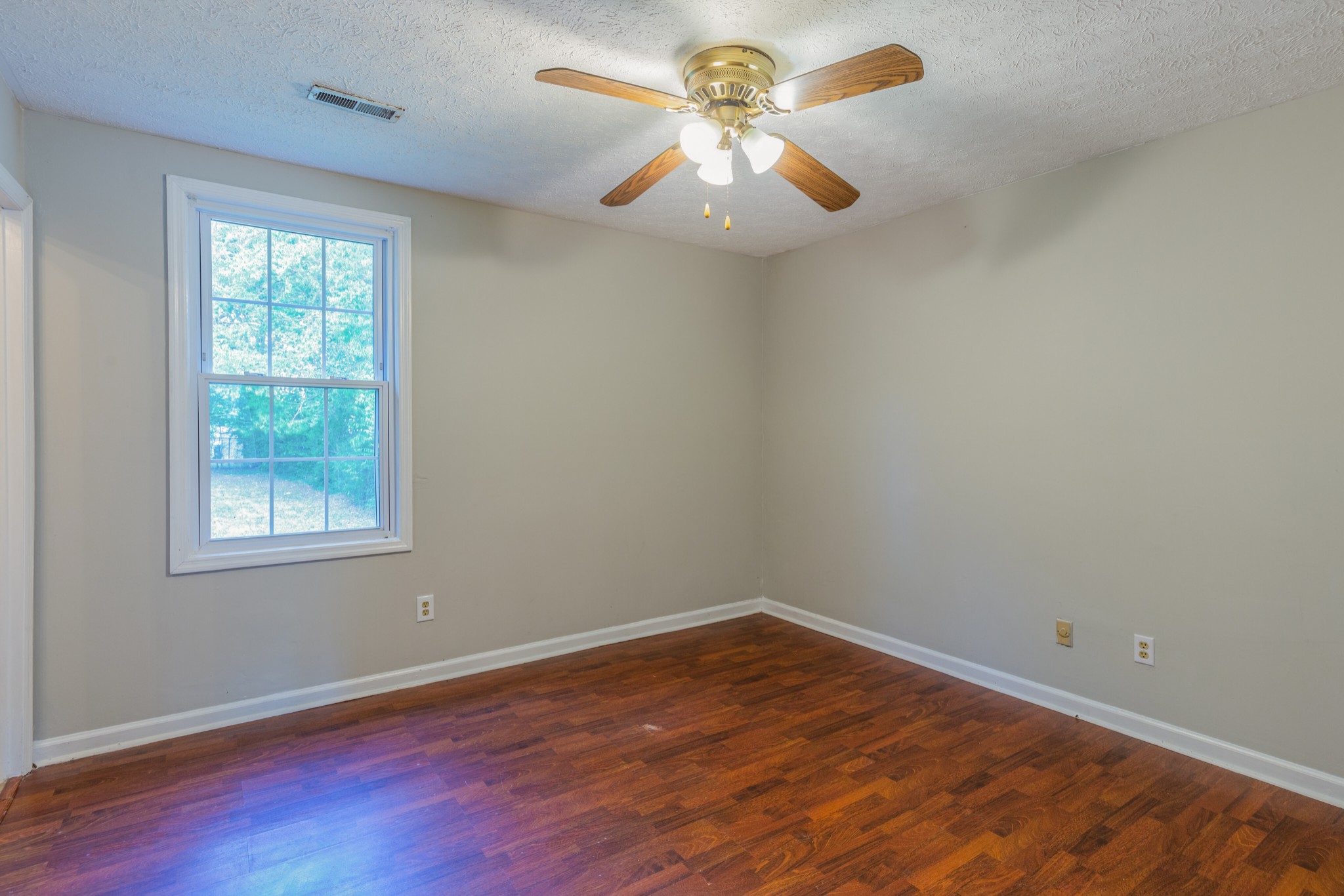 229 Manzano Road Madison, TN 37115 - Photo 18 of 26 an empty room with a window