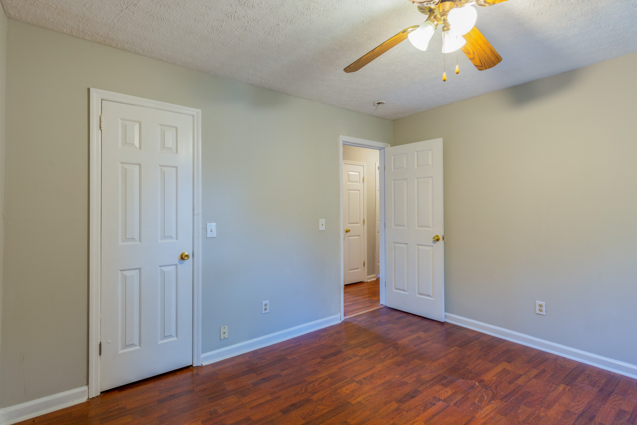 229 Manzano Road Madison, TN 37115 - Photo 19 of 26 wooden floor in an empty room with a window
