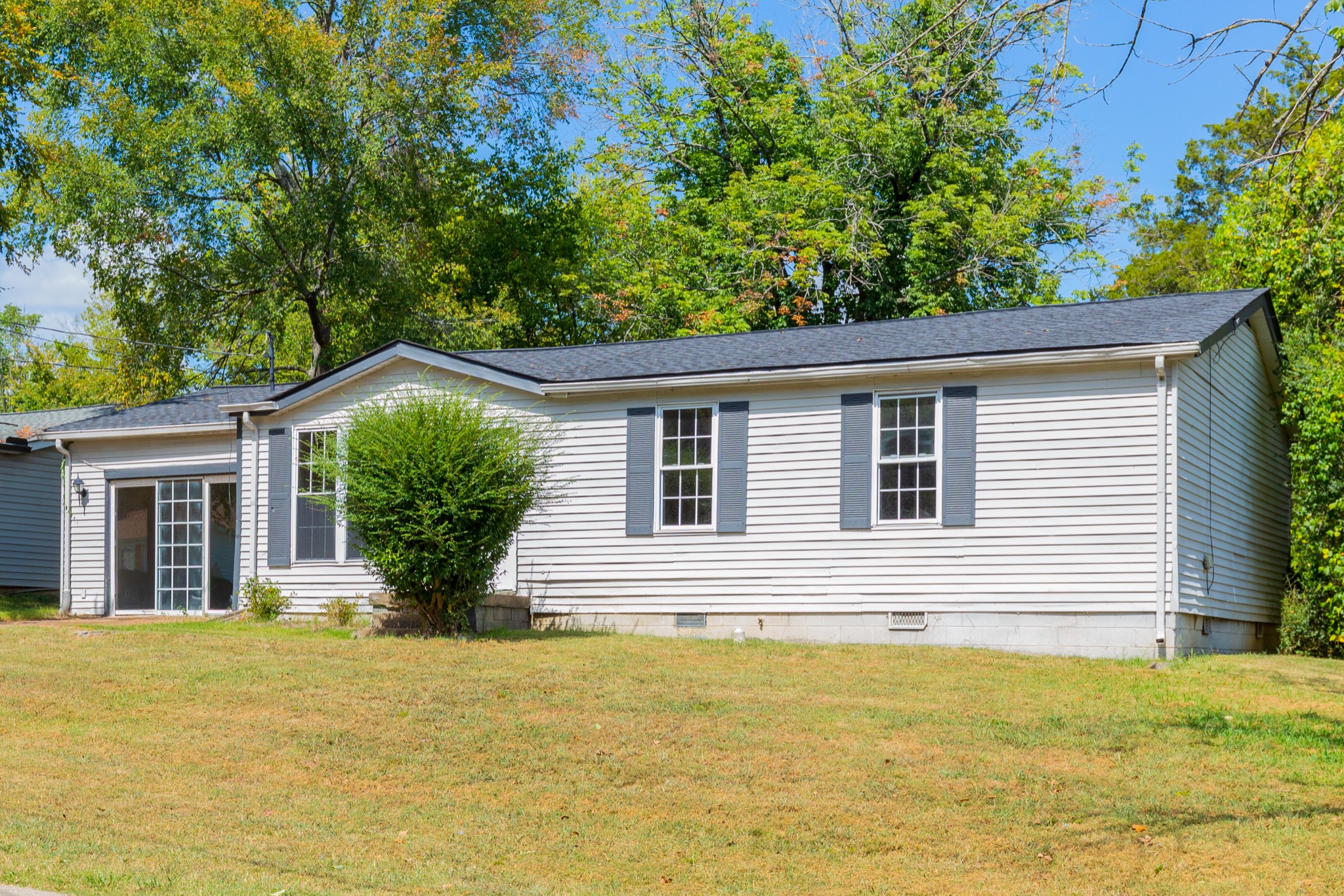 229 Manzano Road Madison, TN 37115 - Photo 2 of 26 a house view with a garden space