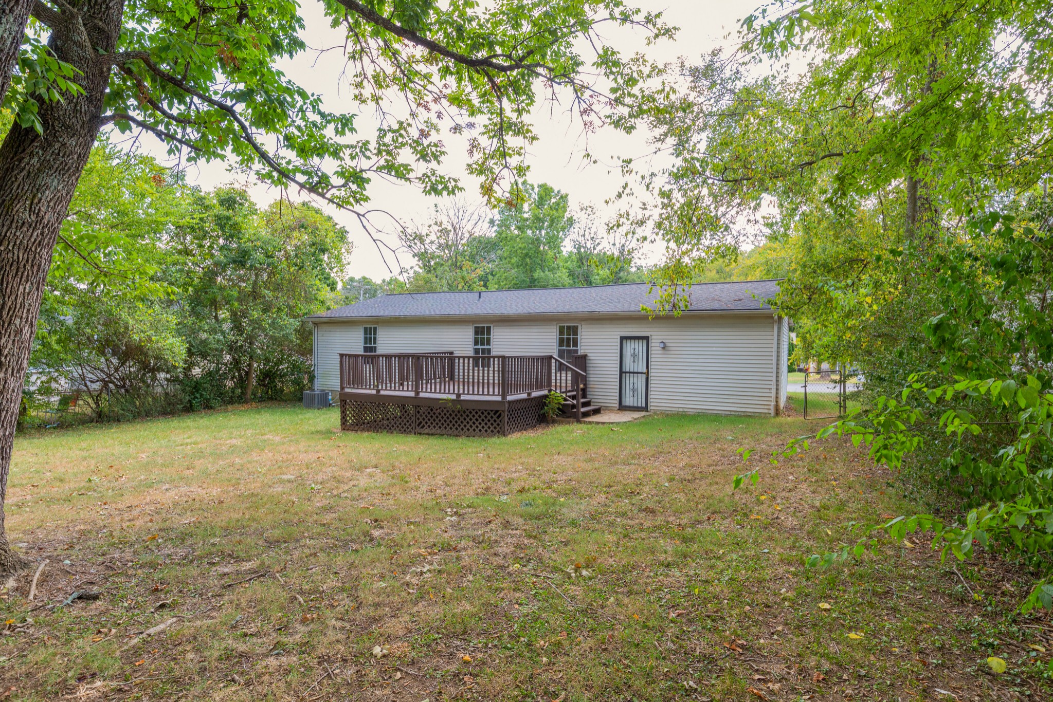 229 Manzano Road Madison, TN 37115 - Photo 23 of 26 a view of a house with a backyard