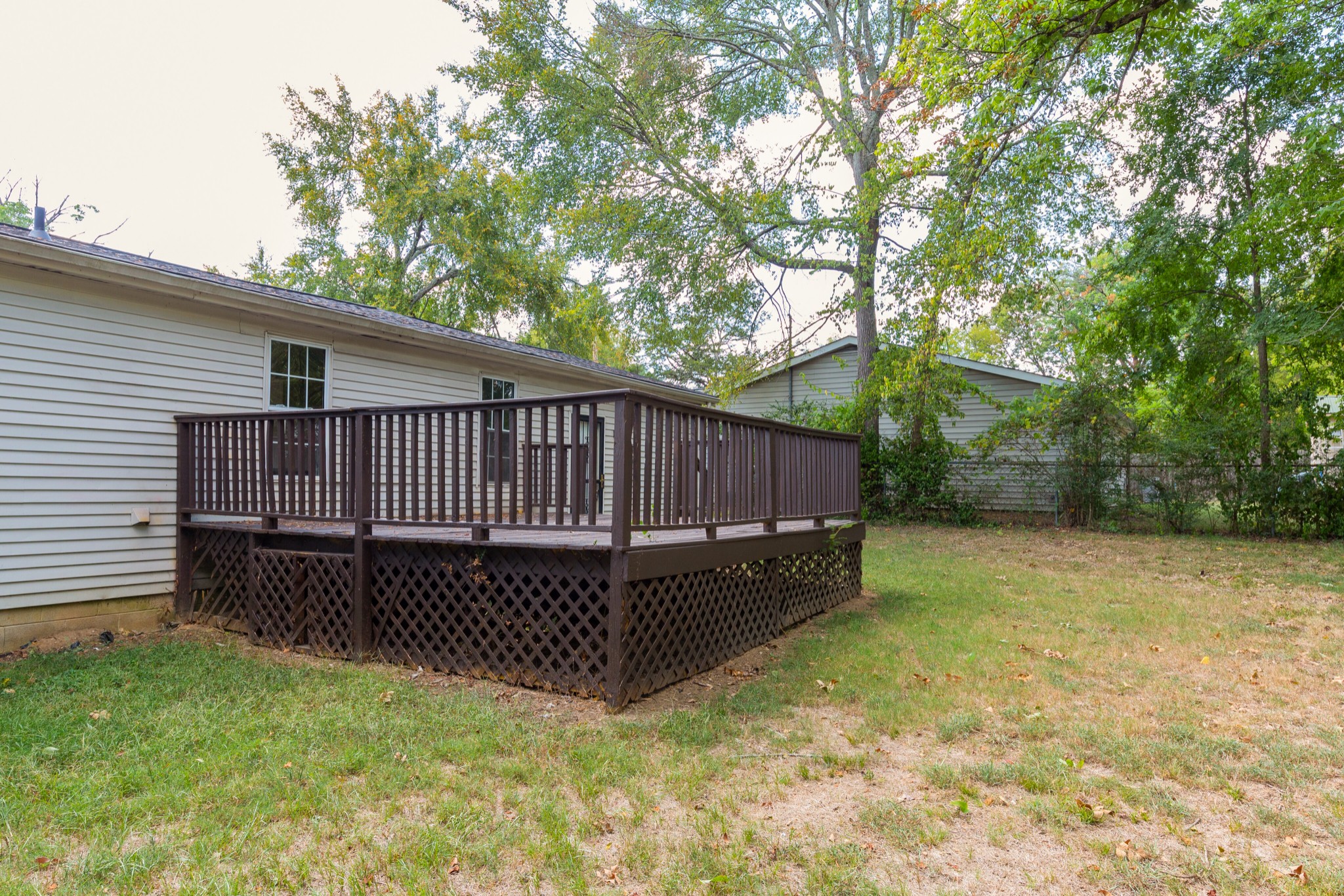 229 Manzano Road Madison, TN 37115 - Photo 25 of 26 a view of a backyard with fence