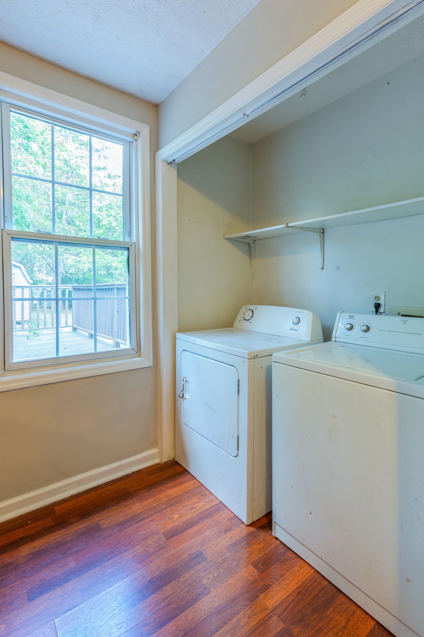 229 Manzano Road Madison, TN 37115 - Photo 10 of 26 a utility room with washer and dryer