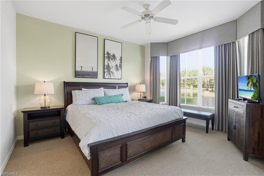 7920 Mahogany Run Lane, Unit 1015 Naples, FL 34113 - Photo 17 of 35 PRIMARY BEDROOM SUITE WITH WATER VIEWS FROM ALL WINDOWS!!