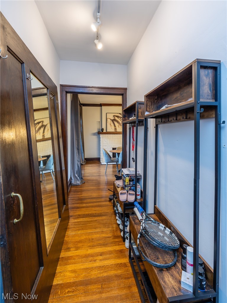 2473 Overlook Road, Unit 9 Cleveland, OH 44106 - Photo 5 of 22 Corridor with hardwood flooring and track lighting