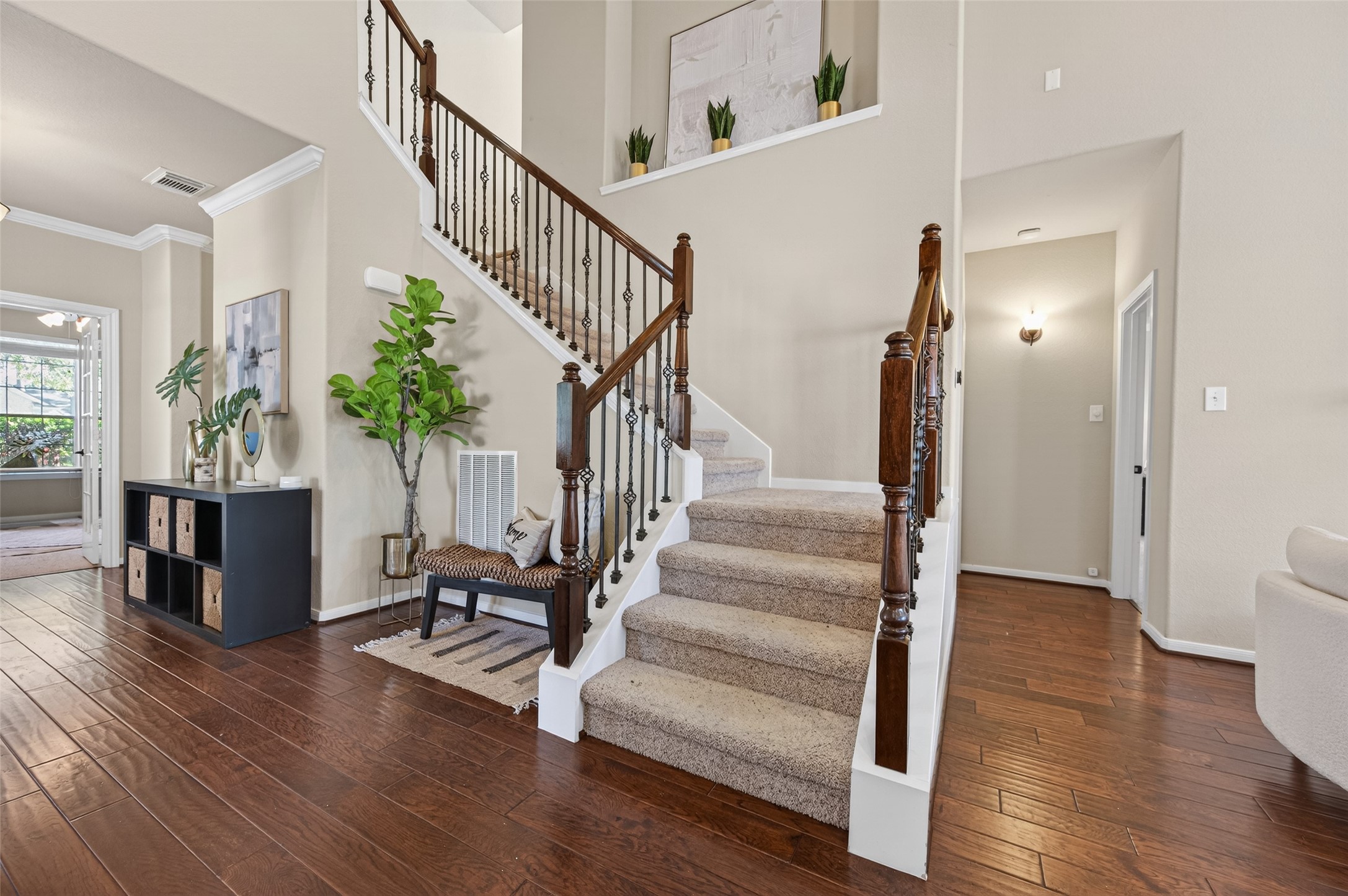 155 Rocky Point Drive Spring, TX 77389 - Photo 11 of 28 a view of entryway with wooden floor and stairs