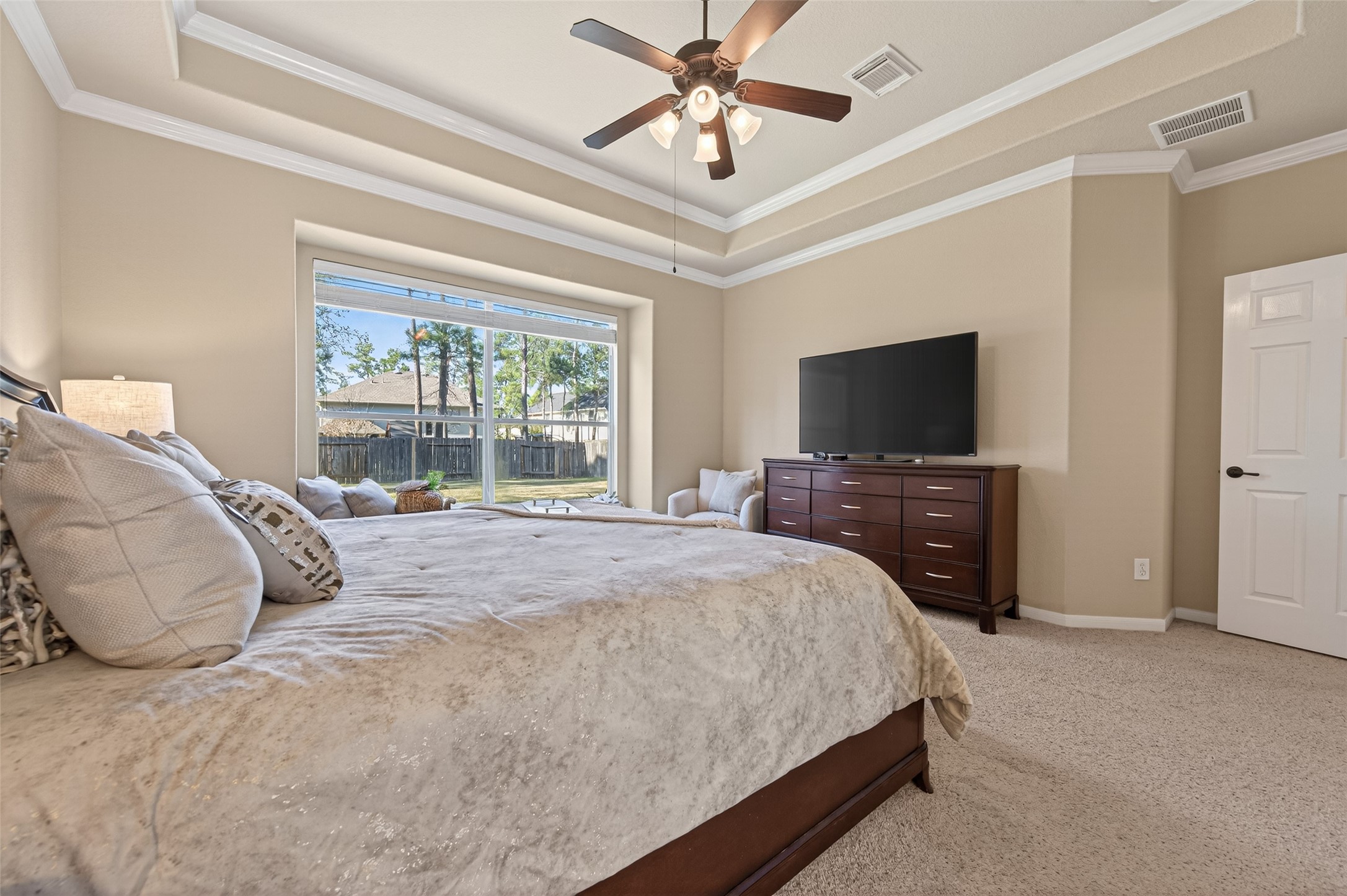 155 Rocky Point Drive Spring, TX 77389 - Photo 17 of 28 a bedroom with a bed and a flat screen tv