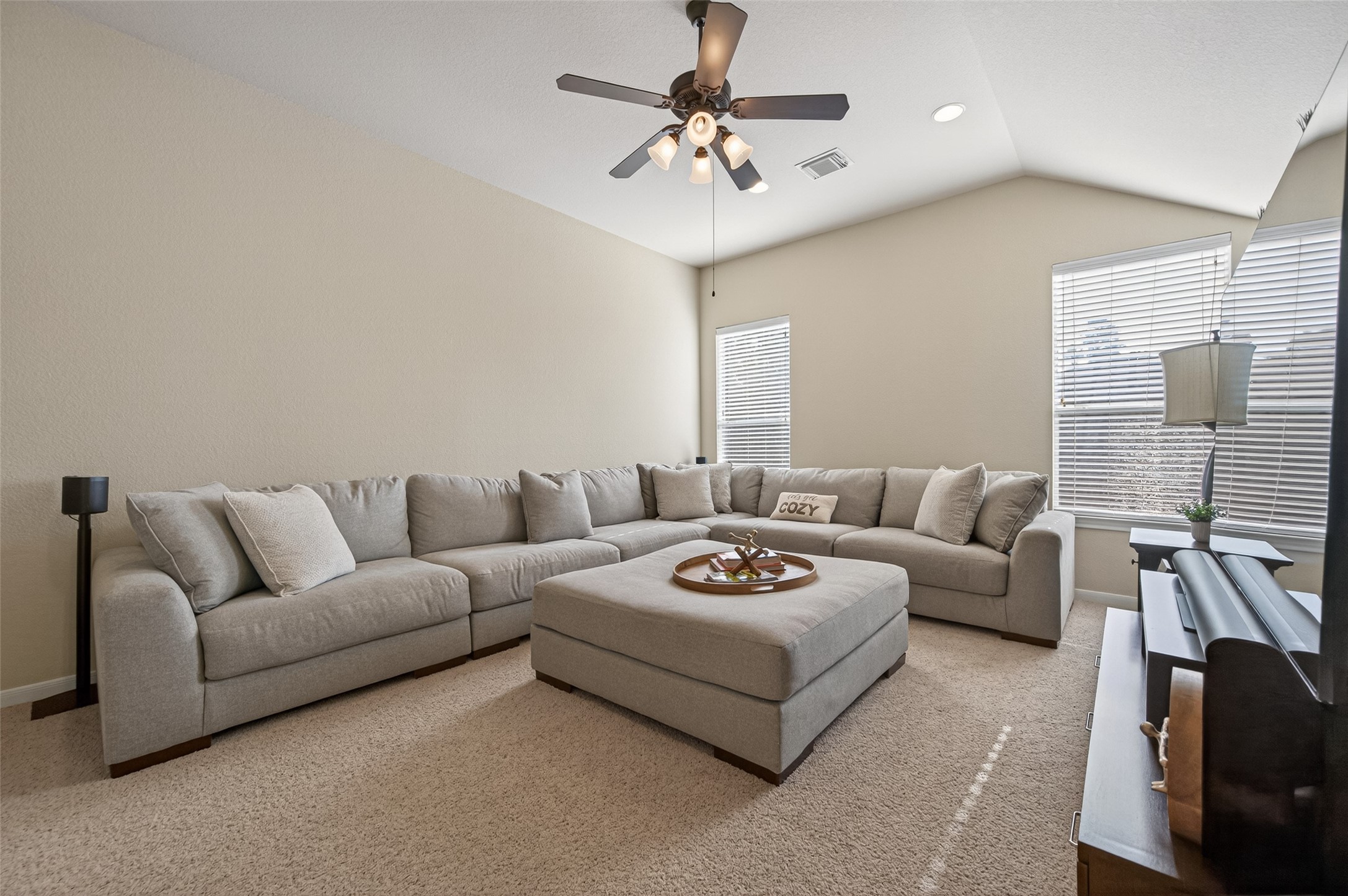 155 Rocky Point Drive Spring, TX 77389 - Photo 19 of 28 a living room with furniture a chandelier and a couch