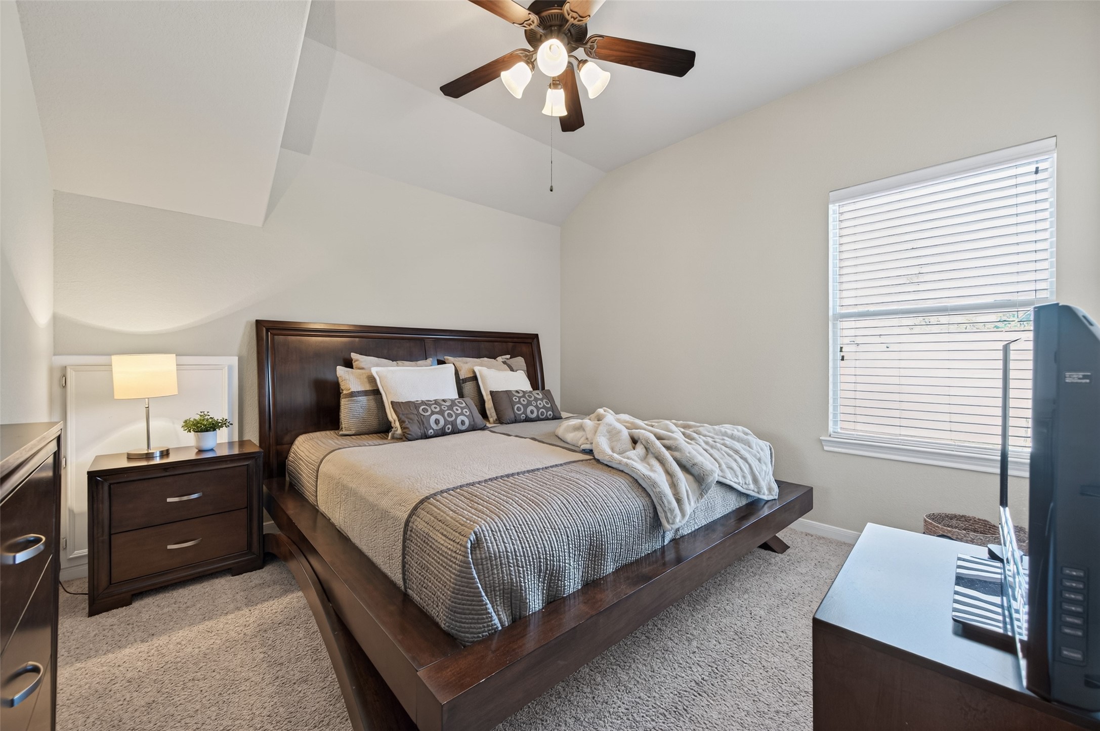 155 Rocky Point Drive Spring, TX 77389 - Photo 20 of 28 a bedroom with a bed and window