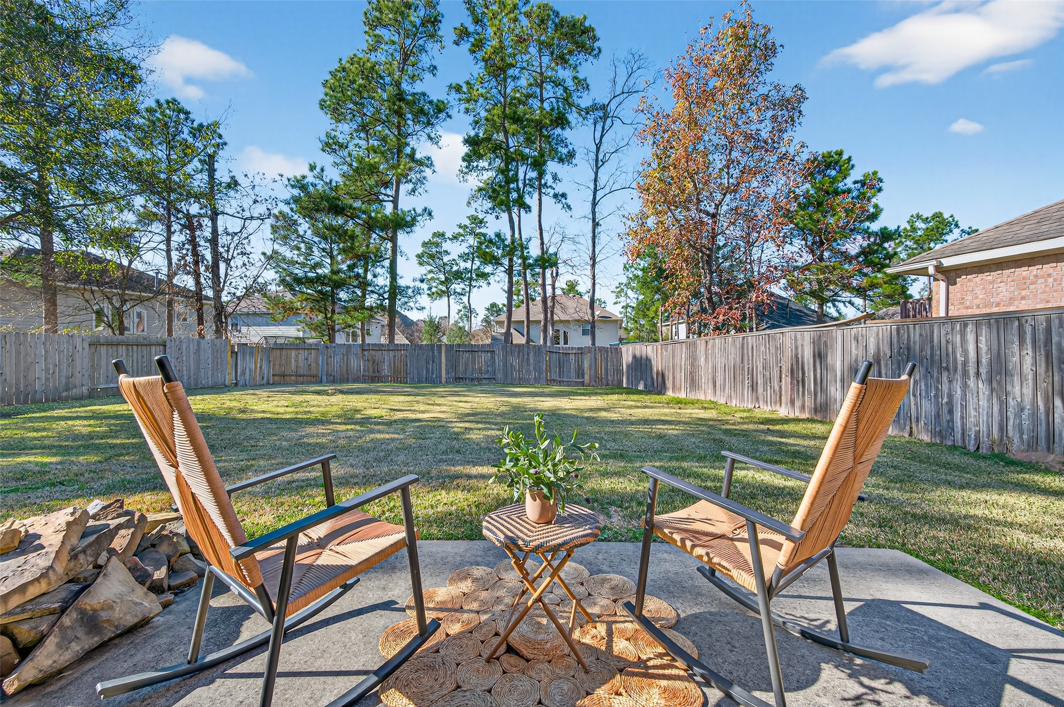 155 Rocky Point Drive Spring, TX 77389 - Photo 26 of 28 a view of a chairs and backyard with a slide