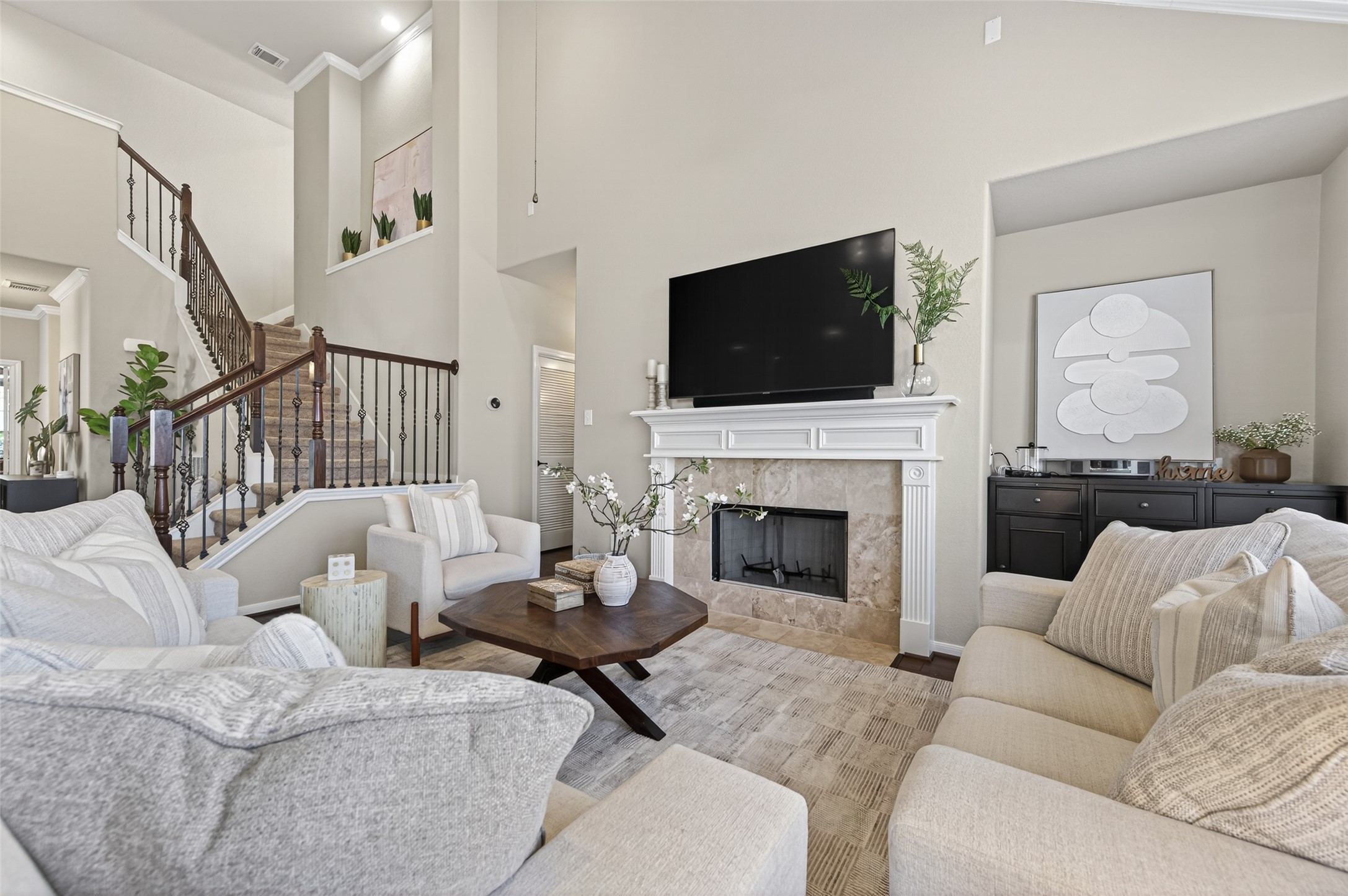 155 Rocky Point Drive Spring, TX 77389 - Photo 4 of 28 a living room with furniture a fireplace and a flat screen tv