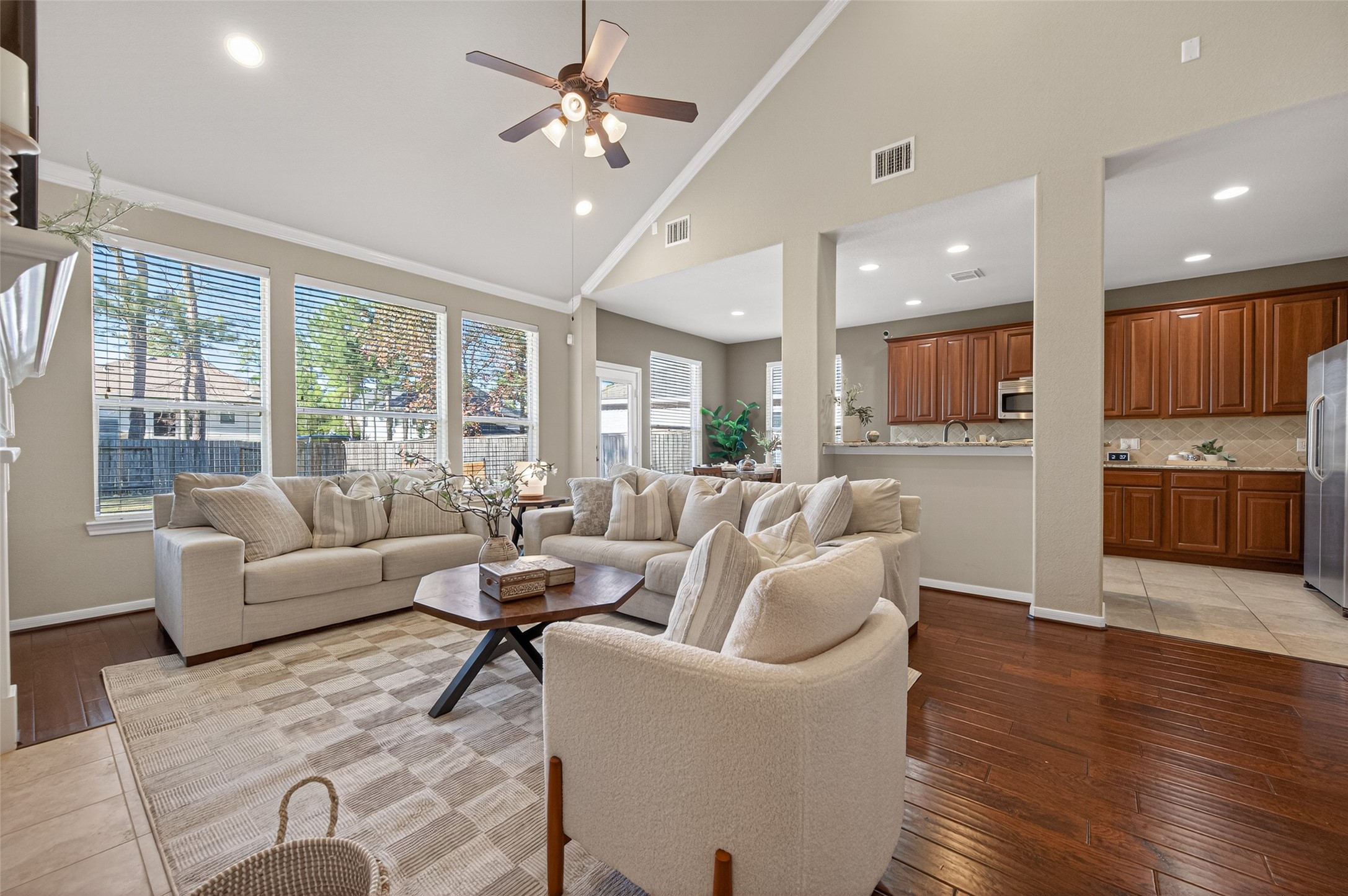 155 Rocky Point Drive Spring, TX 77389 - Photo 5 of 28 a living room with furniture wooden floor and a kitchen view