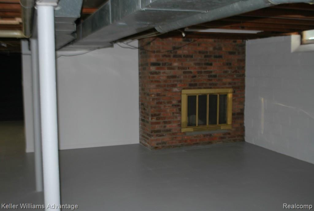 36554 West Lyman Road Farmington, MI 48331 - Photo 24 of 31 Basement natural fireplace