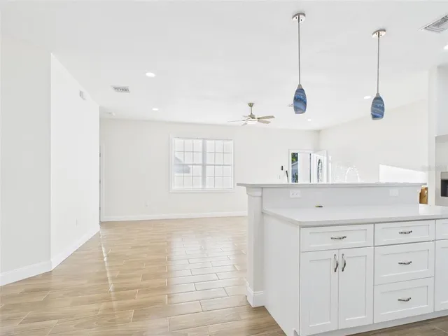 a view of cabinets and window