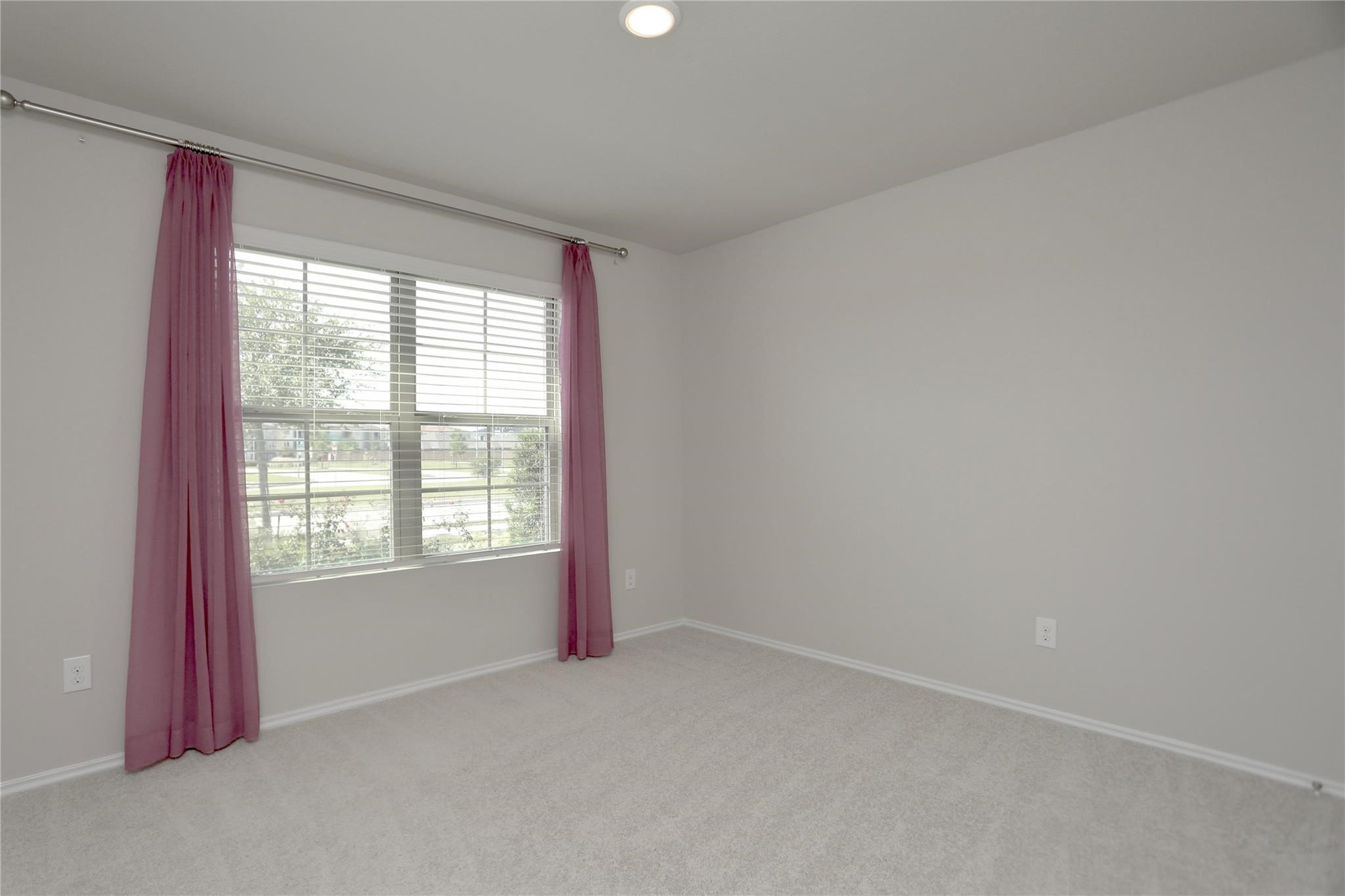 2123 Santa Ana Way Baytown, TX 77523 - Photo 15 of 20 a view of an empty room with a window