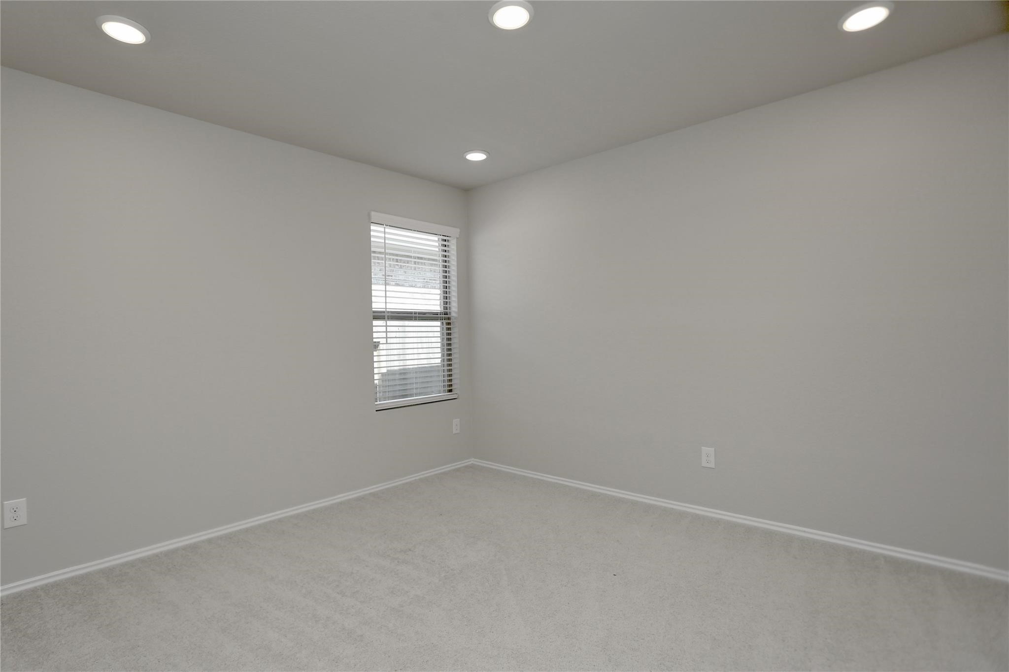 2123 Santa Ana Way Baytown, TX 77523 - Photo 17 of 20 an empty room with a window