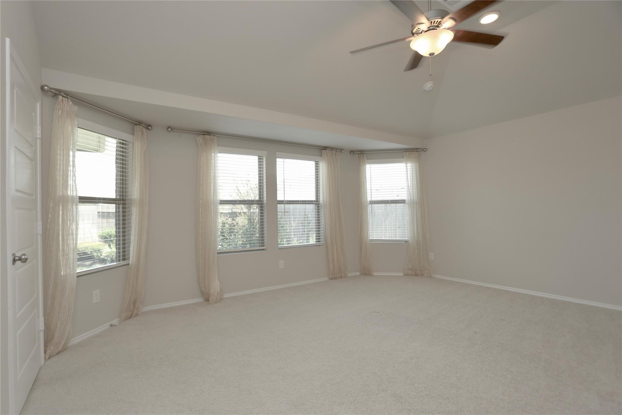 2123 Santa Ana Way Baytown, TX 77523 - Photo 10 of 20 a view of an empty room with a window