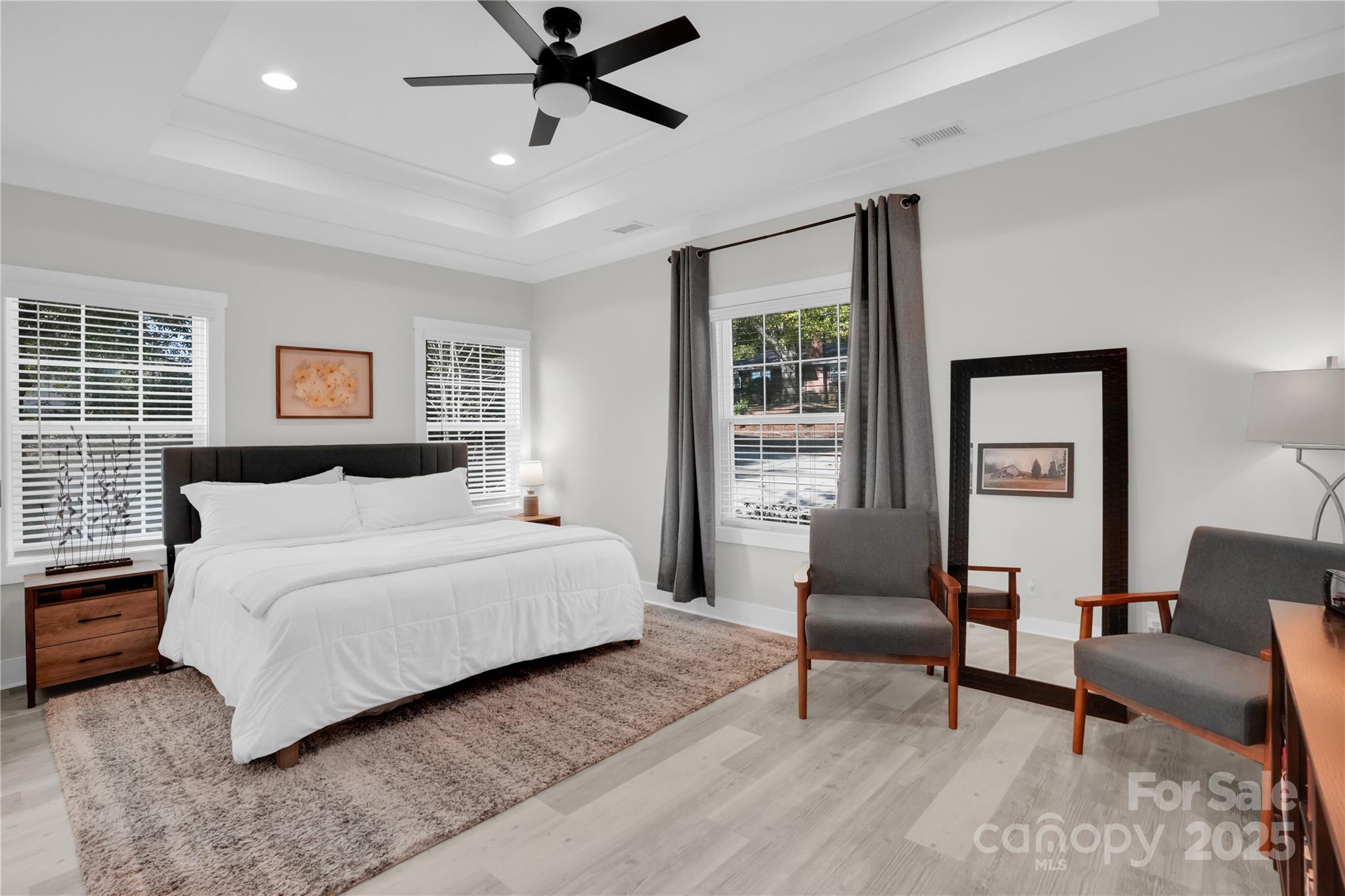 203 A Todd Street Belmont, NC 28012 - Photo 12 of 30 a bedroom with a large bed couch and a window