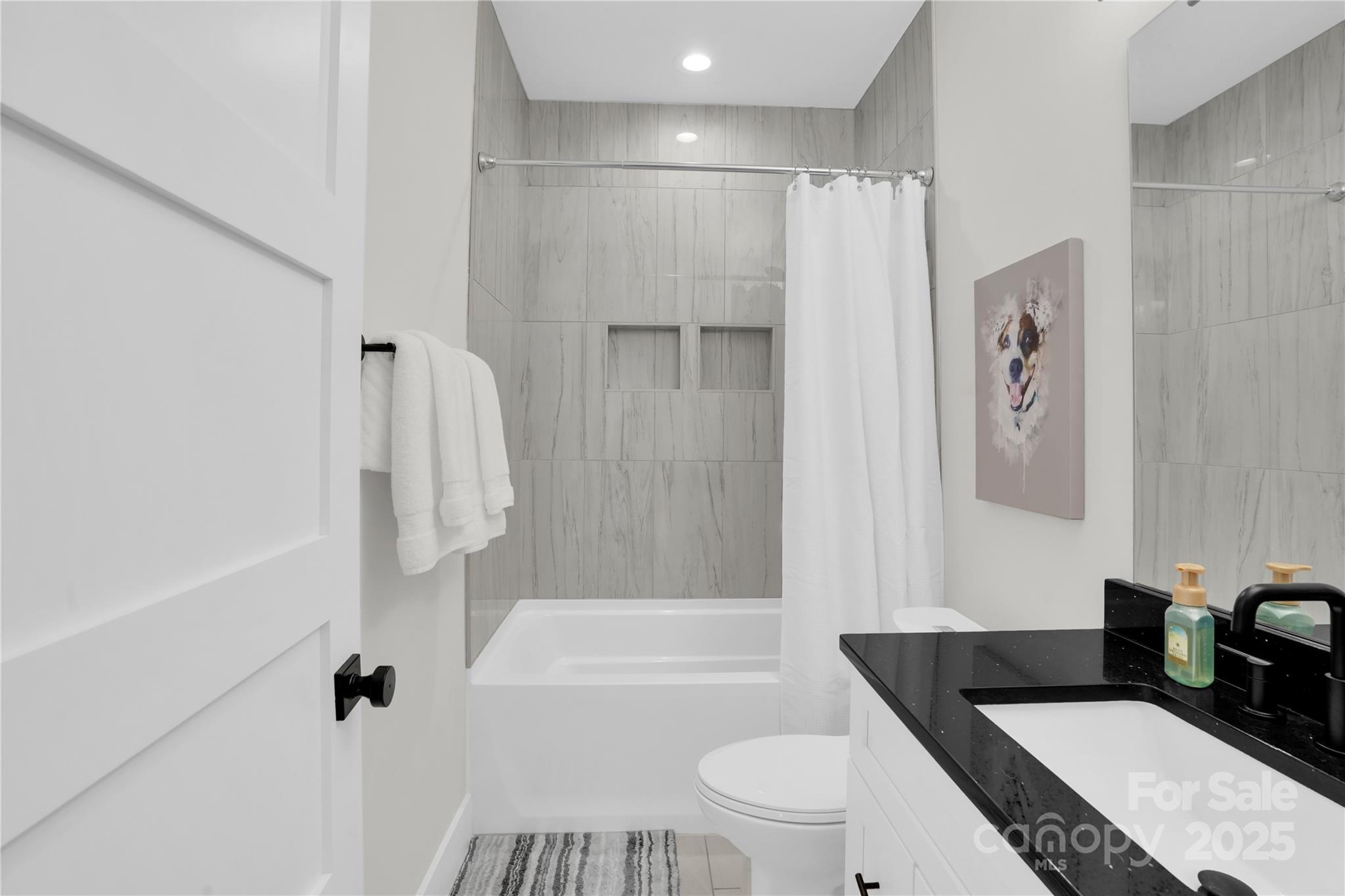 203 A Todd Street Belmont, NC 28012 - Photo 19 of 30 a bathroom with a granite countertop sink toilet and shower